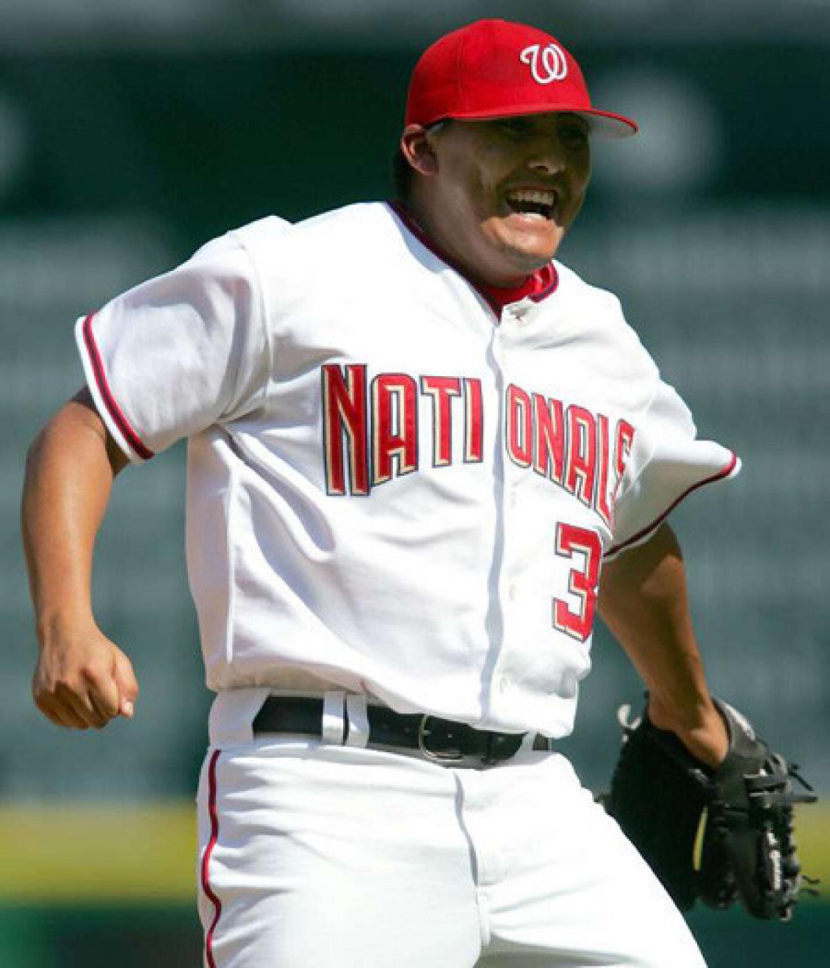 Chad Cordero celebrates after recording the final out against the Seattle Mariners during a game for the Washington Nationals.