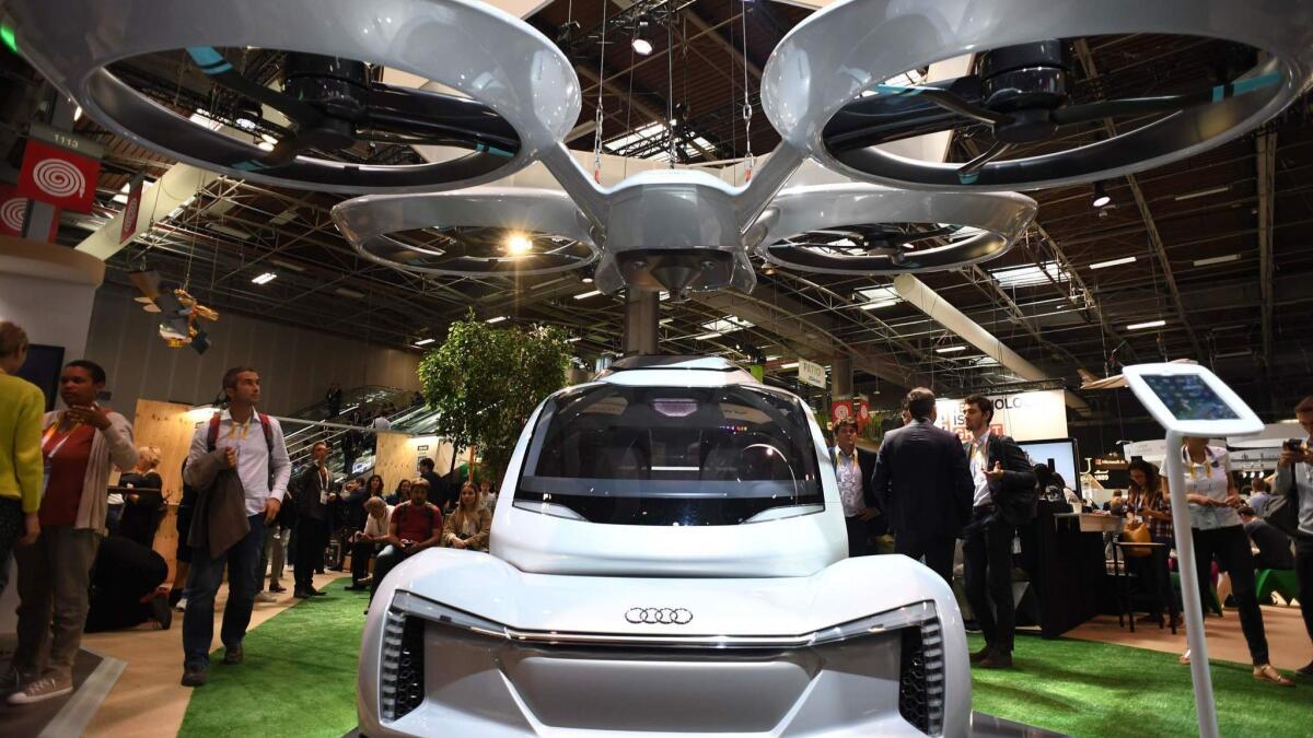 A flying car prototype, developed by Airbus and the German car manufacturer Audi, is pictured at the Vivatech conference Thursday in Paris.