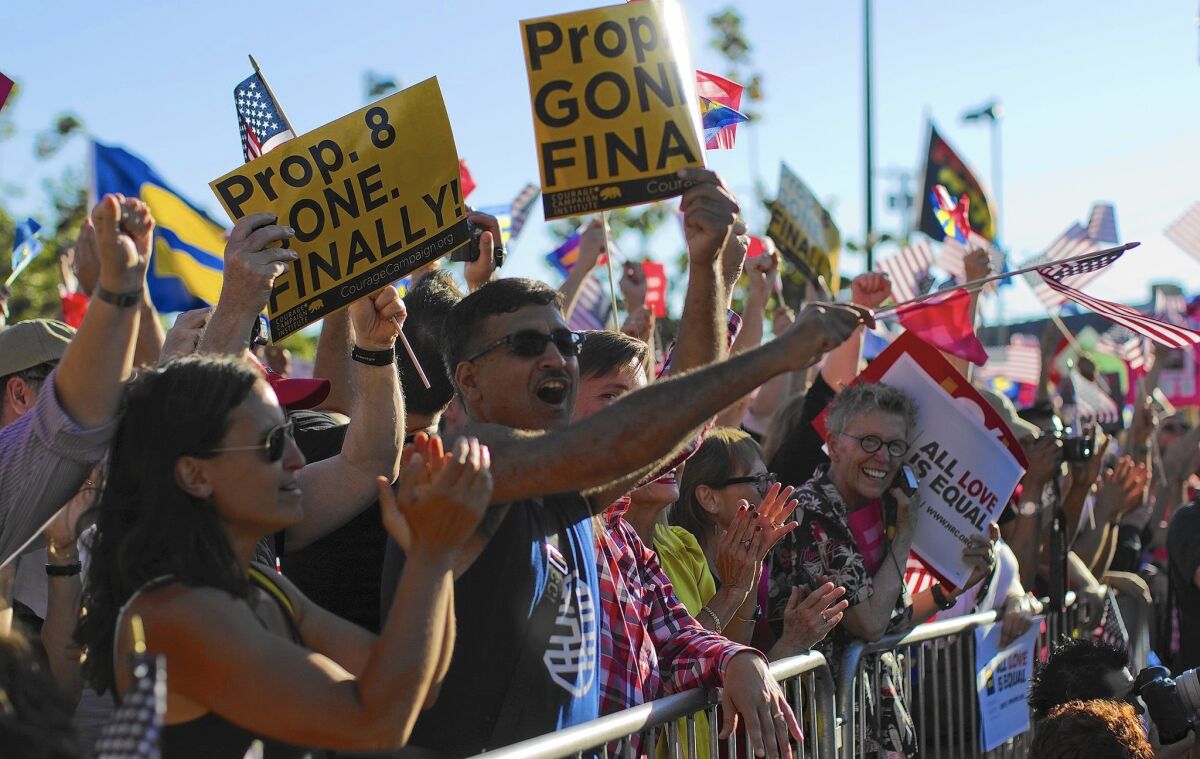 People rally in West Hollywood in 2013 to celebrate the Supreme Court ruling that struck down California's Proposition 8, which had banned same-sex marriage. The Mormon Church, an ardent supporter of Proposition 8, was caught off guard by the fury provoked by the campaign.
