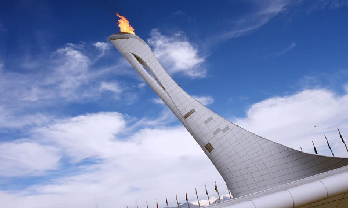 The 2014 Winter Olympic flame burns at the Olympic Park, in Sochi, Russia, on Wednesday. ESPN hasn't been showing many highlights from the Winter Olympics.