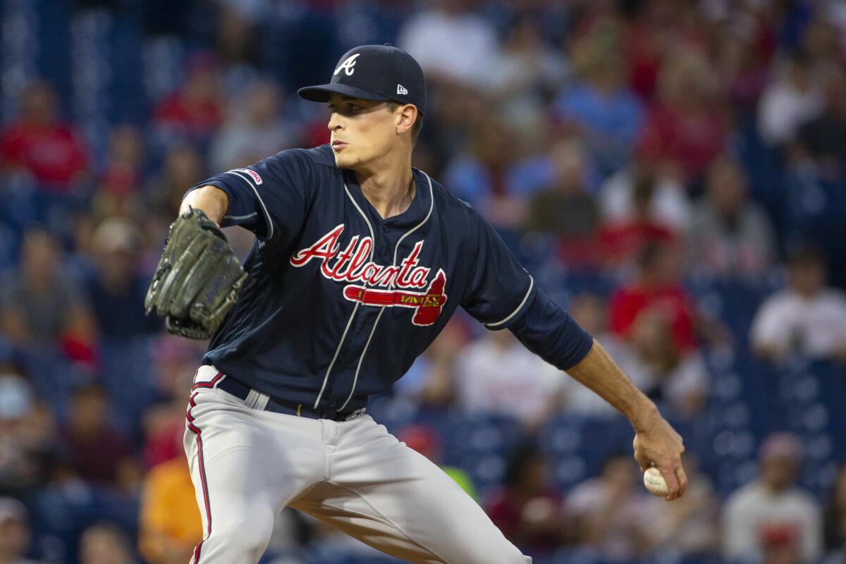 Atlanta's Max Fried prepares to unleash a pitch.