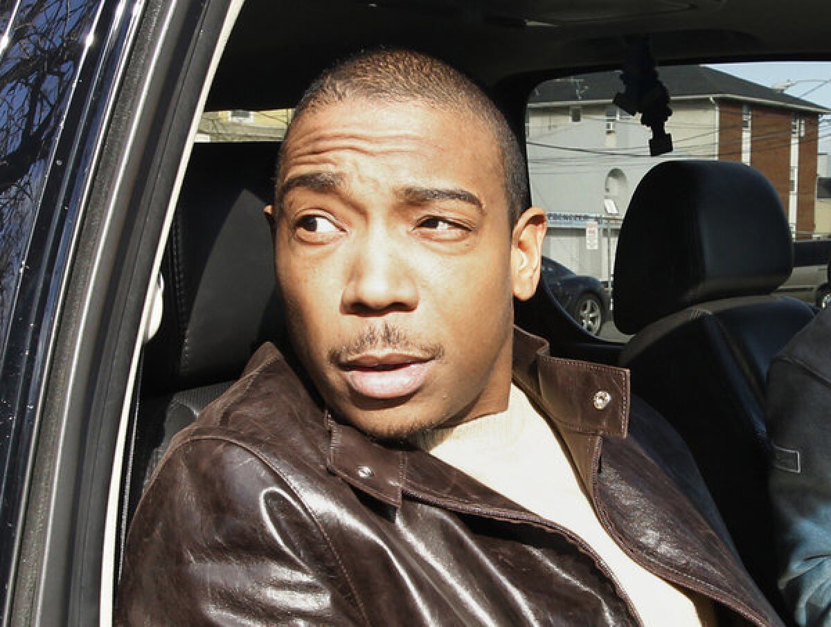 Ja Rule is shown in March 2011 after pleading guilty to federal tax-evasion charges in Newark, N.J. On Tuesday, he traded federal prison for home confinement, where he'll serve the balance of his sentence.