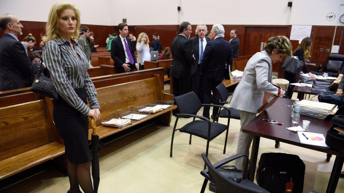 Summer Zervos, left, appears at a New York state court hearing Tuesday in her defamation suit against President Trump.