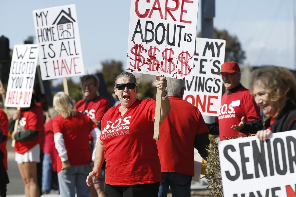 Donna Andrade joins others in a Mobile Home Resident Coalition rally.