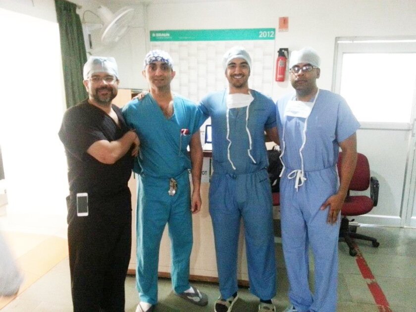 Dr. Munish Batra of Rancho Santa Fe at left in black, with other doctors on a previous mission. Courtesy photos