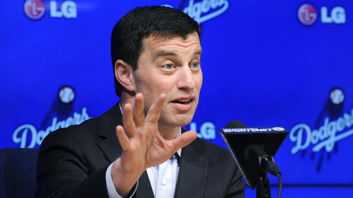 Andrew Friedman, Dodgers president of baseball operations, speaks during a news conference at Dodger Stadium on Oct. 17.