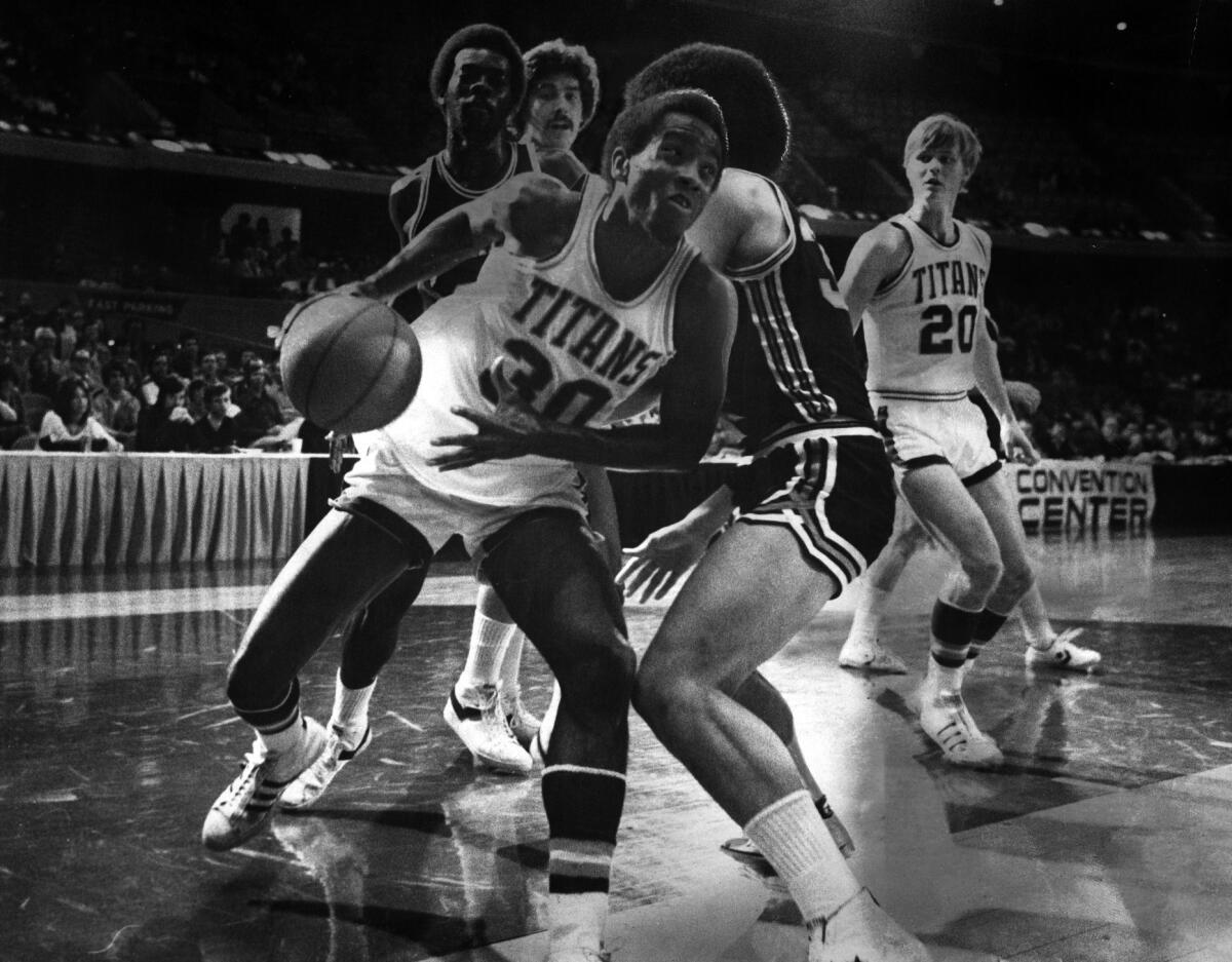 Cal State Fullerton's Greg Bunch drives to the basket in a March 14, 1978 game.