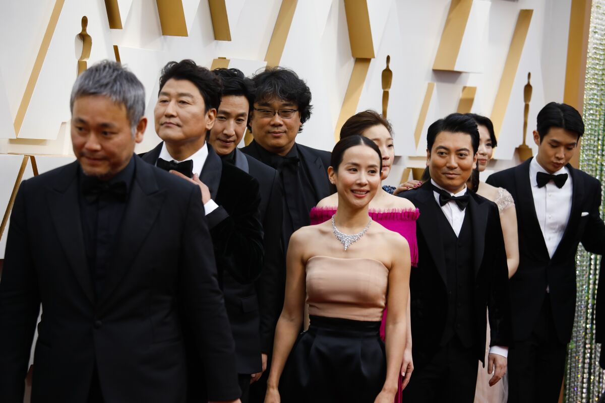 The cast and crew of "Parasite" and director Bong Joon Ho arriving at the 92nd Academy Awards.