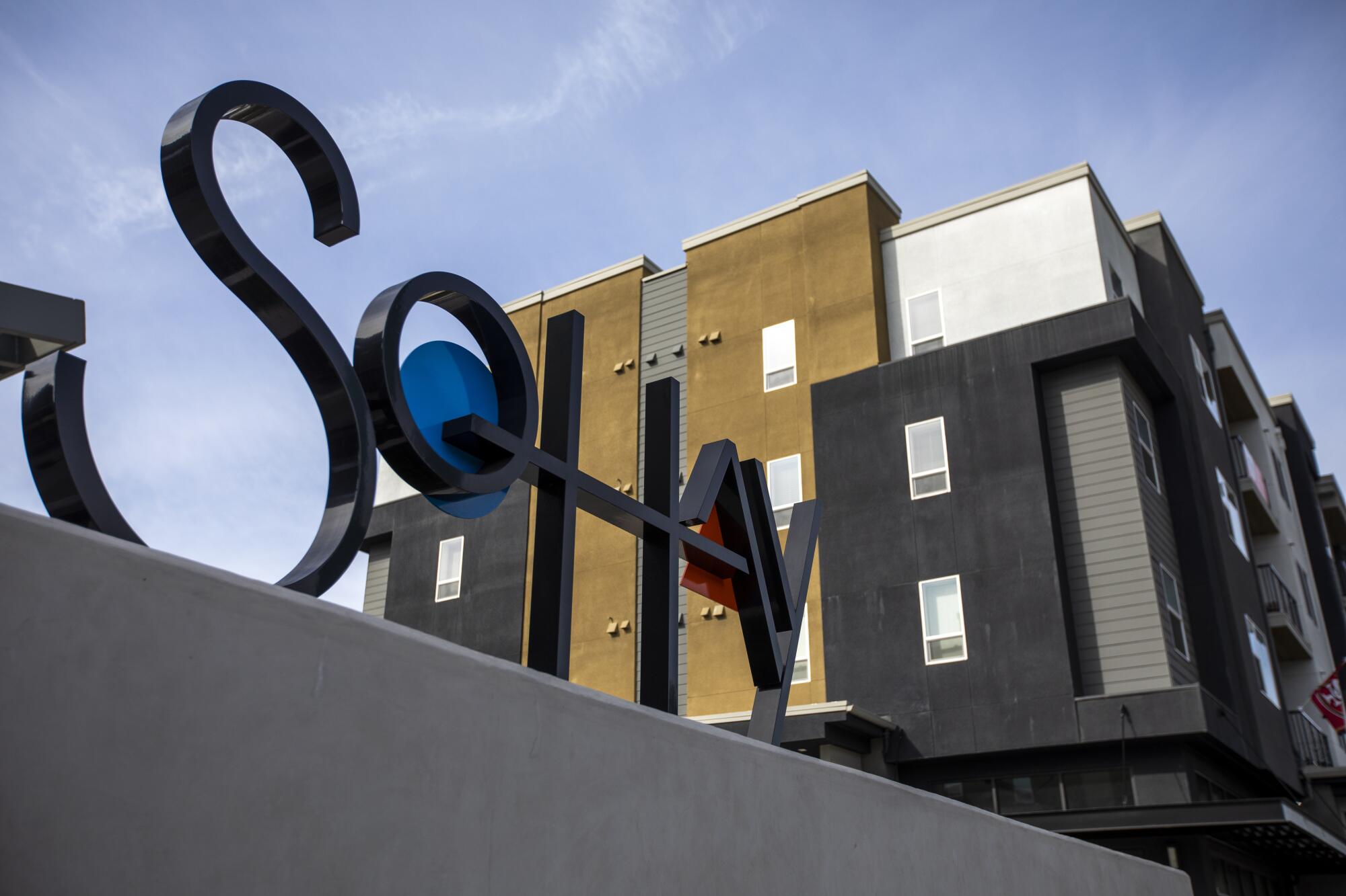 Construction crews are finishing a nearly 500-unit mixed-income apartment and townhouse project called SoHay.