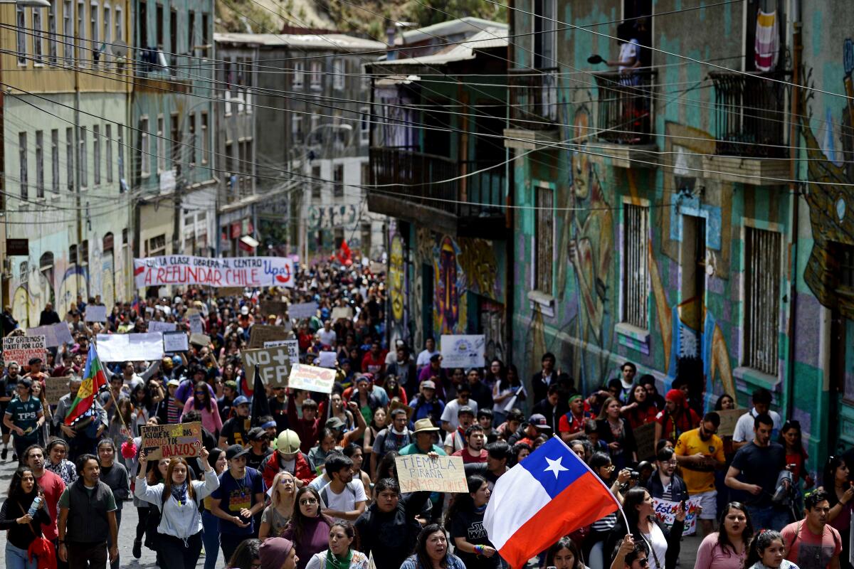 Demonstrators march in Valparaiso, Chile