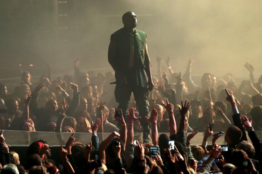 Recording artist Kanye West performs at the DirecTV Super Bowl party in Glendale, Ariz., on Jan. 31.