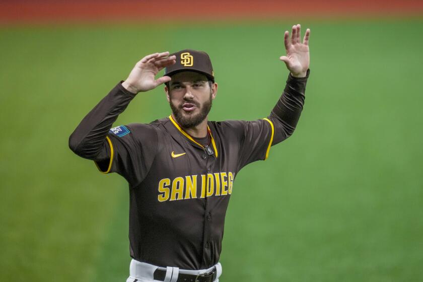 San Diego Padres starting pitcher Dylan Cease runs a drill during a baseball workout at the Gocheok Sky Dome in Seoul, South Korea, Saturday, March 16, 2024. (AP Photo/Lee Jin-man)