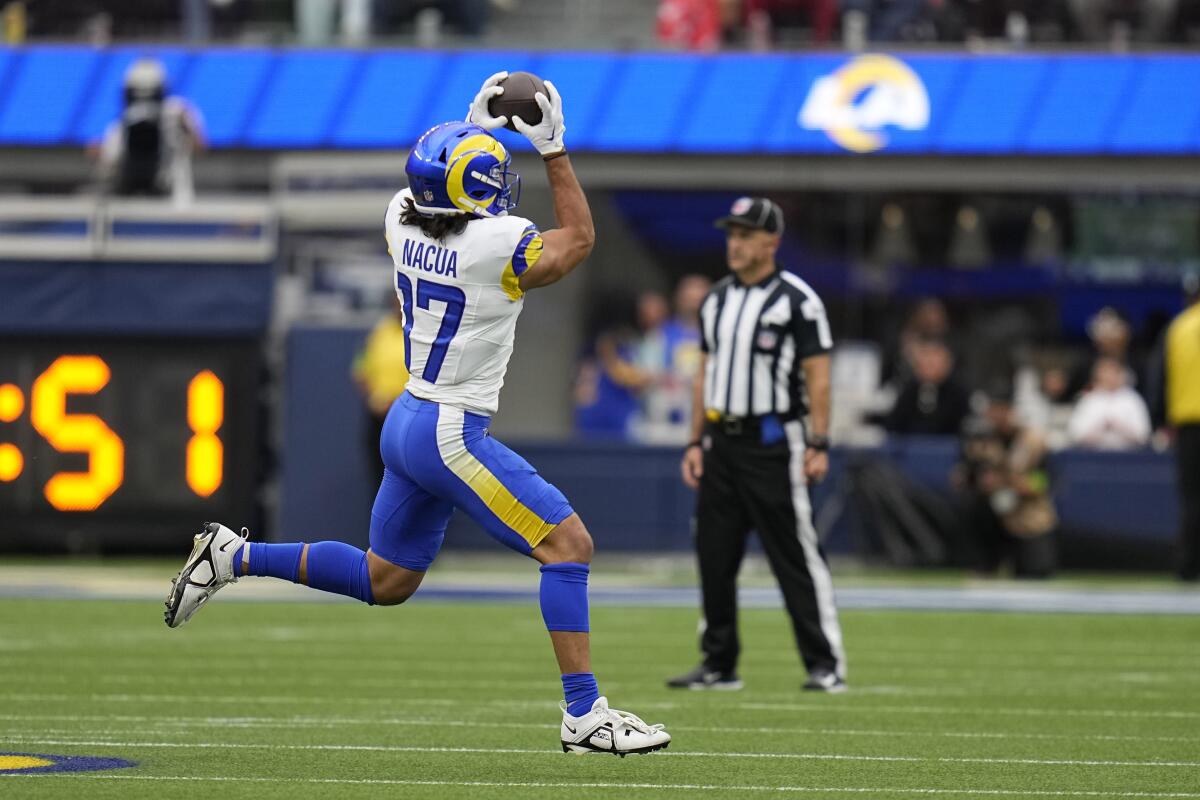 Puka Nacua of the Rams makes a catch during the second half.