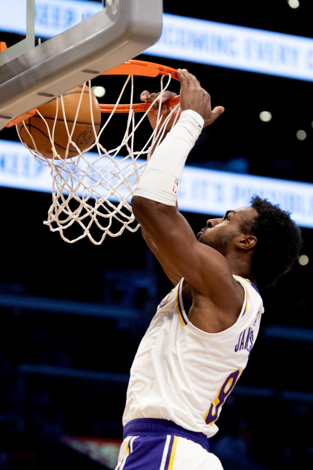 Jake LaRavia will not be unknown to Lakers followers for much longer with video games like this 1 Bronny James dunks during the first half against Miami on Sunday.