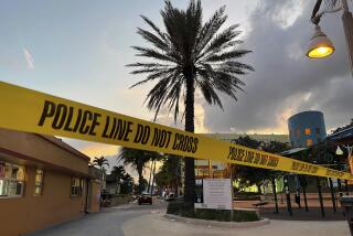 Police respond to a shooting near the Hollywood Beach Broadwalk in Hollywood, Fla., Monday evening, May 29, 2023. (Mike Stocker/South Florida Sun-Sentinel via AP)