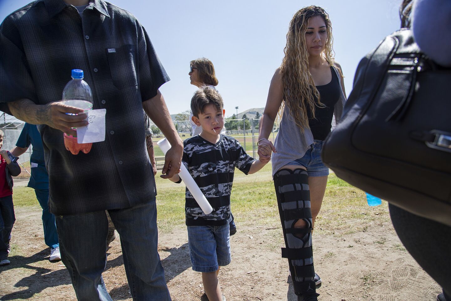 Parents are reunited with their children after a shooting inside North Park Elementary School in San Bernardino.