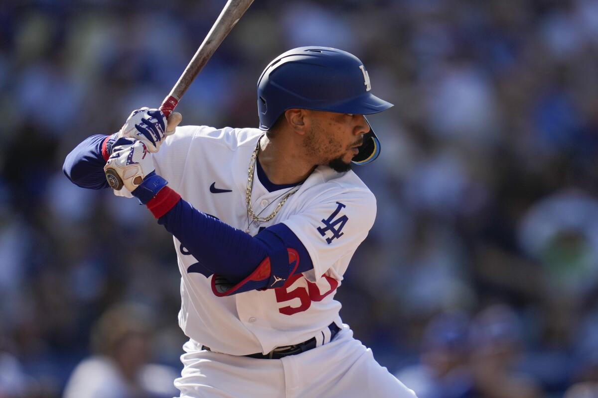Mookie Betts bats for the Dodgers in the third inning Saturday.