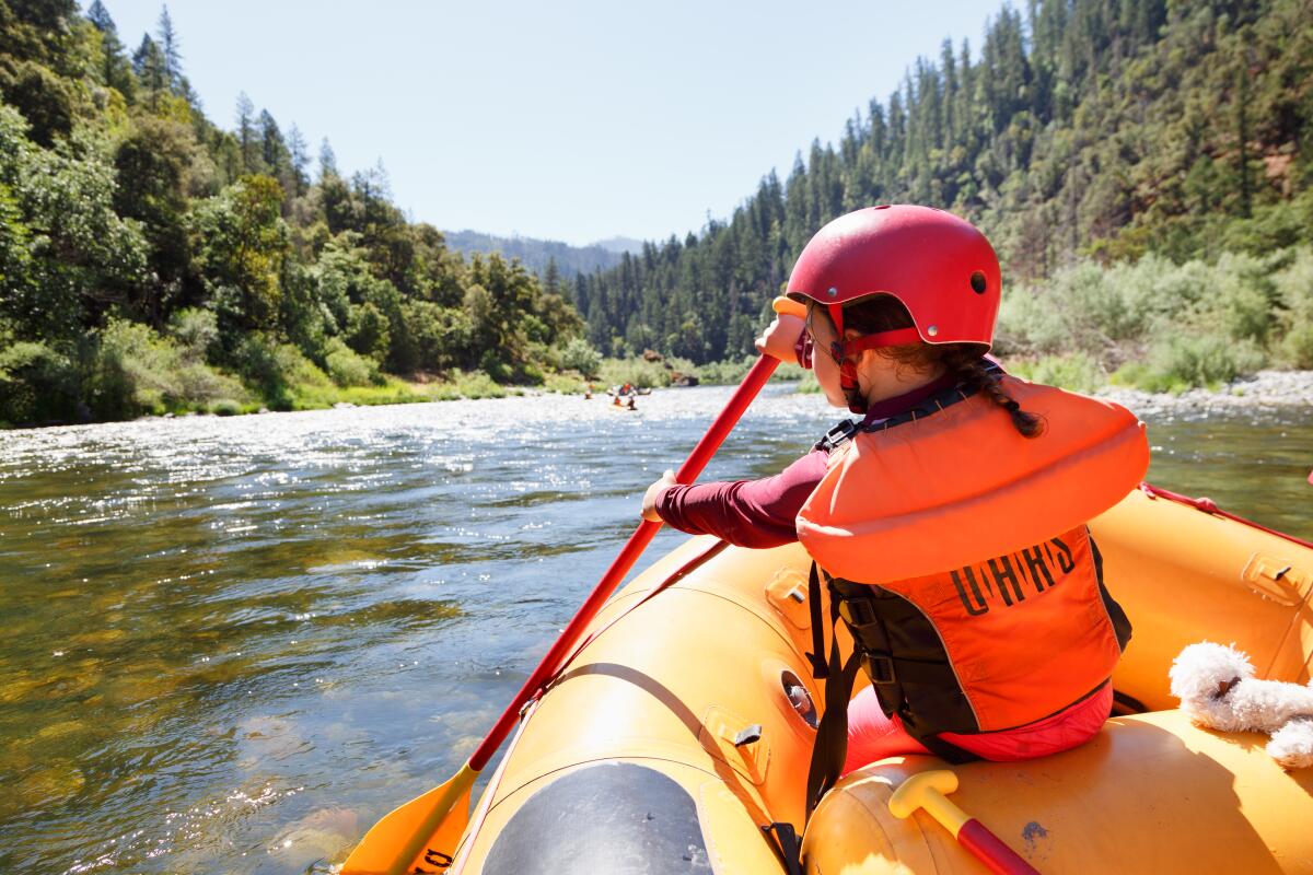 A child rafting on the Lower Klamath River.