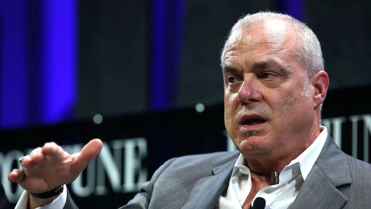 Aetna Chairman and CEO Mark Bertolini, whose merger adventure cost his company about $1.8 billion.