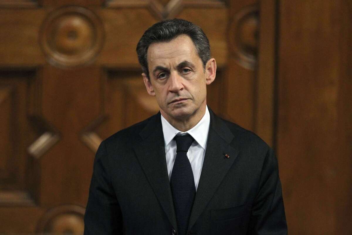 Former French President Nicolas Sarkozy waits to deliver a speech in Nice in 2012.