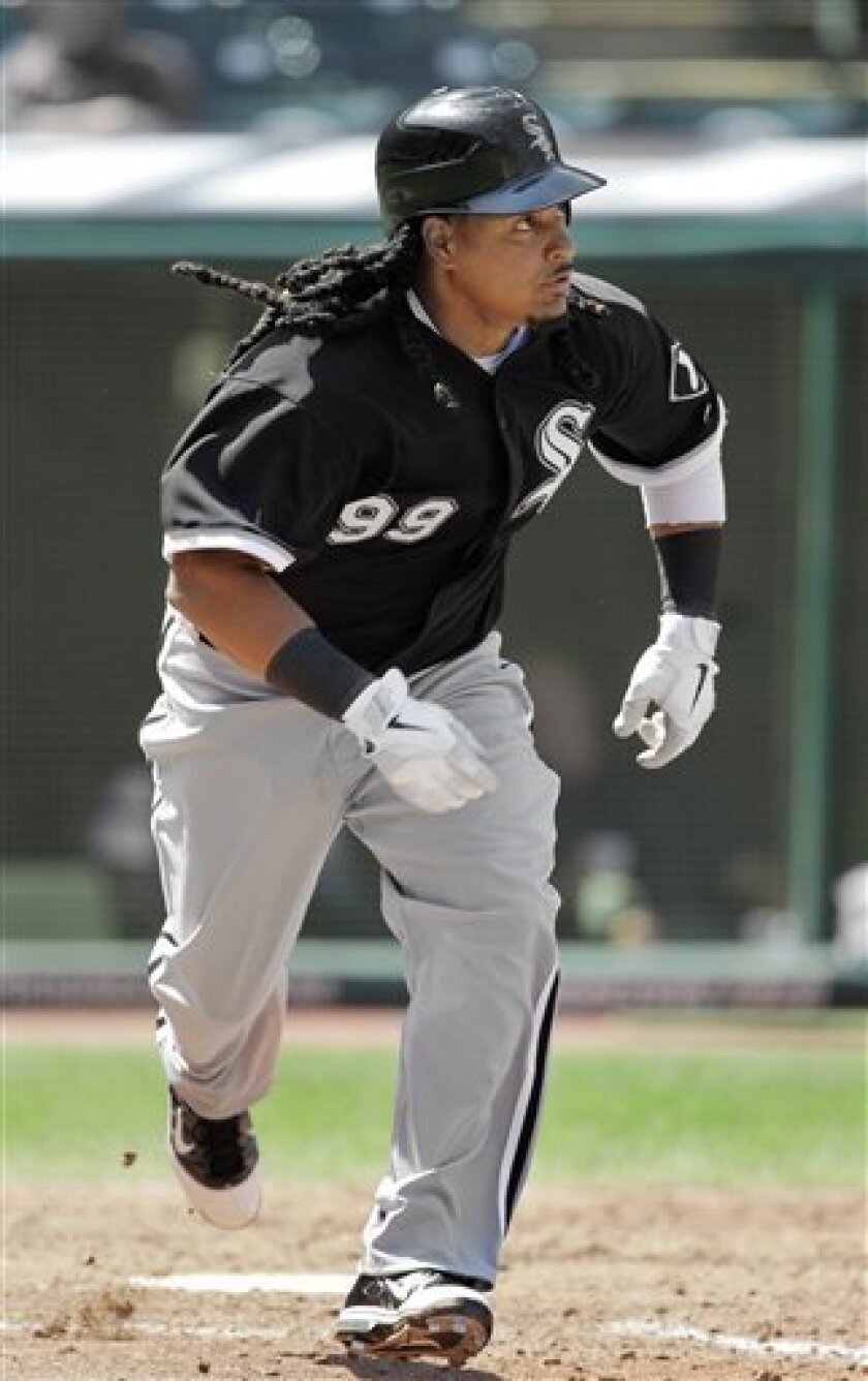 Chicago White Sox's Manny Ramirez runs to first on a single in the seventh inning of a baseball game against the Cleveland Indians Wednesday, Sept. 1, 2010, in Cleveland. (AP Photo/Mark Duncan)