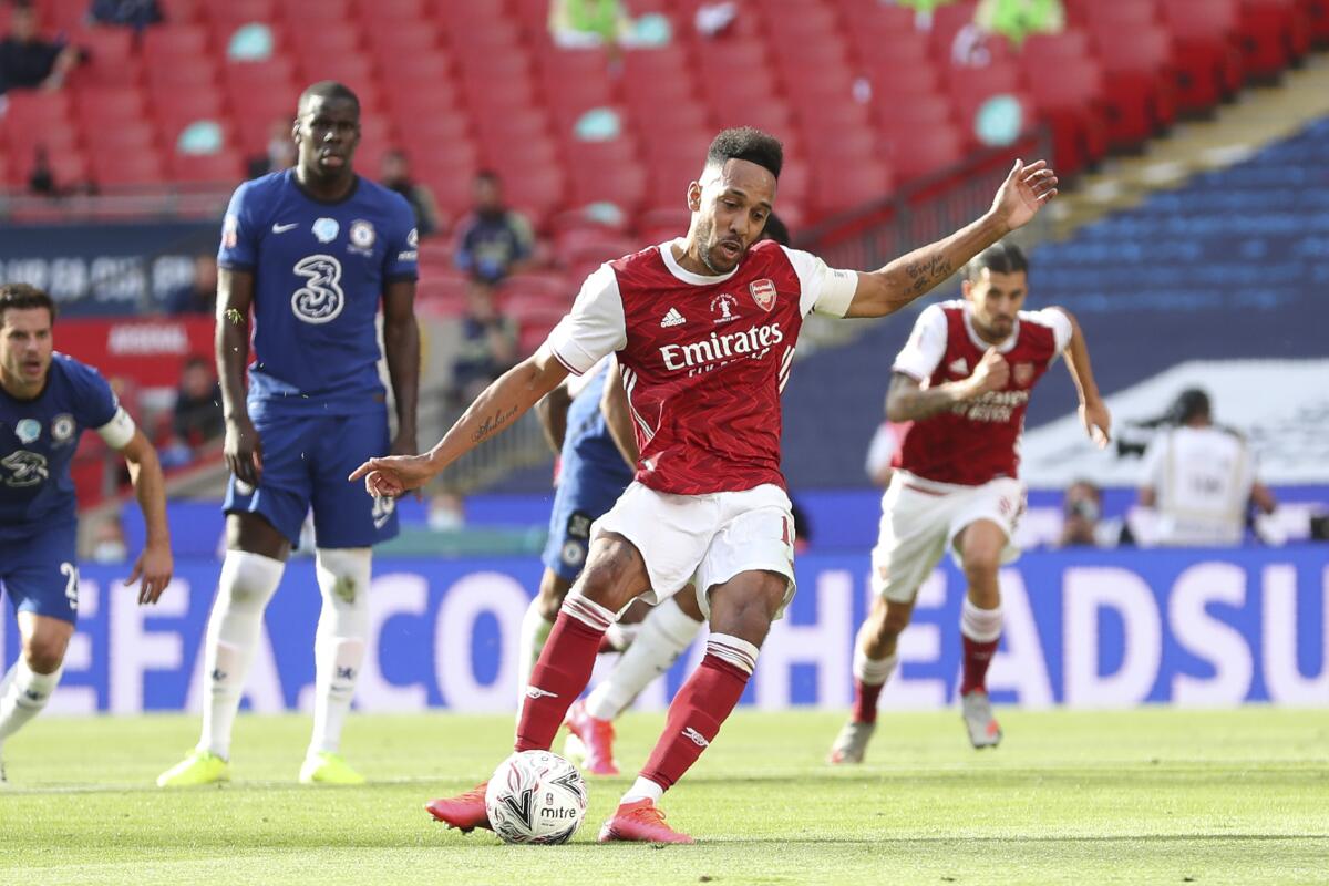Arsenal's Pierre-Emerick Aubameyang scores his side's first goal from the penalty spot, during the FA Cup final in London.