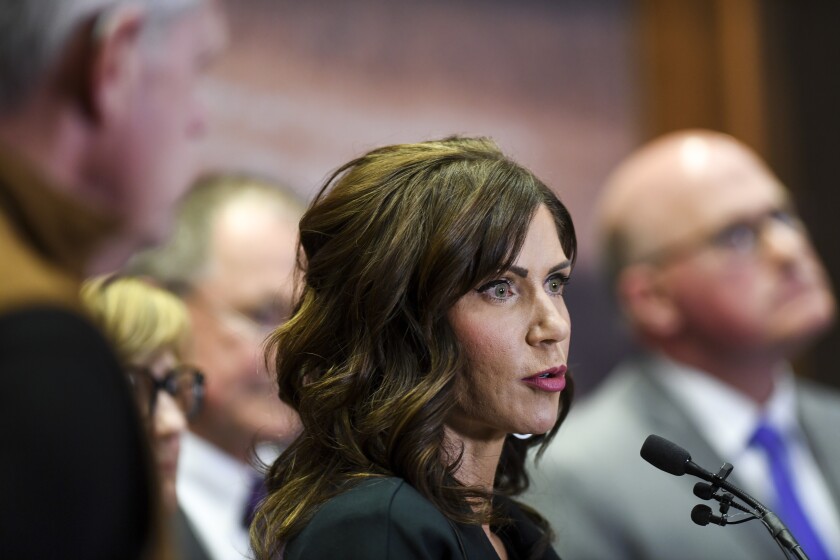 FILE - In this March 17, 2020, file photo, South Dakota Gov. Kristi Noem gives an update on the coronavirus in South Dakota, at the Sanford Center in Sioux Falls, S.D. Some of the nation's governors' offices routinely block access to public records to keep the public in the dark about key decisions involving the coronavirus pandemic. Noem's outspoken business-as-usual approach throughout the coronavirus pandemic has made her a darling of national conservatives and allowed her to hopscotch across the country as a fundraising force. (Abigail Dollins/The Argus Leader via AP, File)/The Argus Leader via AP)