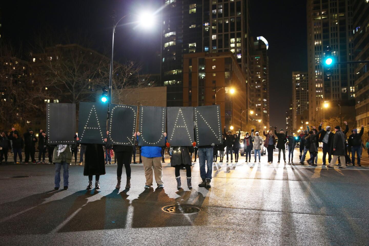 Protesters march on Nov. 24, 2015, after the city released a dash-cam video showing teenager Laquan McDonald being fatally shot by Chicago police Officer Jason Van Dyke.