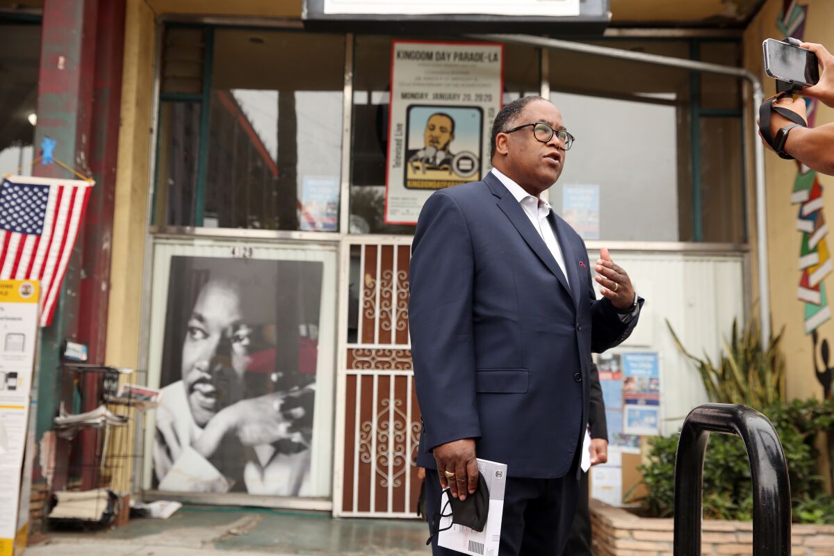 Mark Ridley-Thomas stands outside a polling place