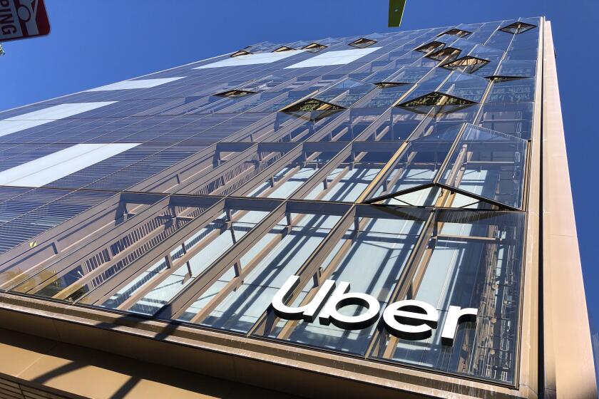 A view looking up towards Uber's facade shows accordion windows that are partially open