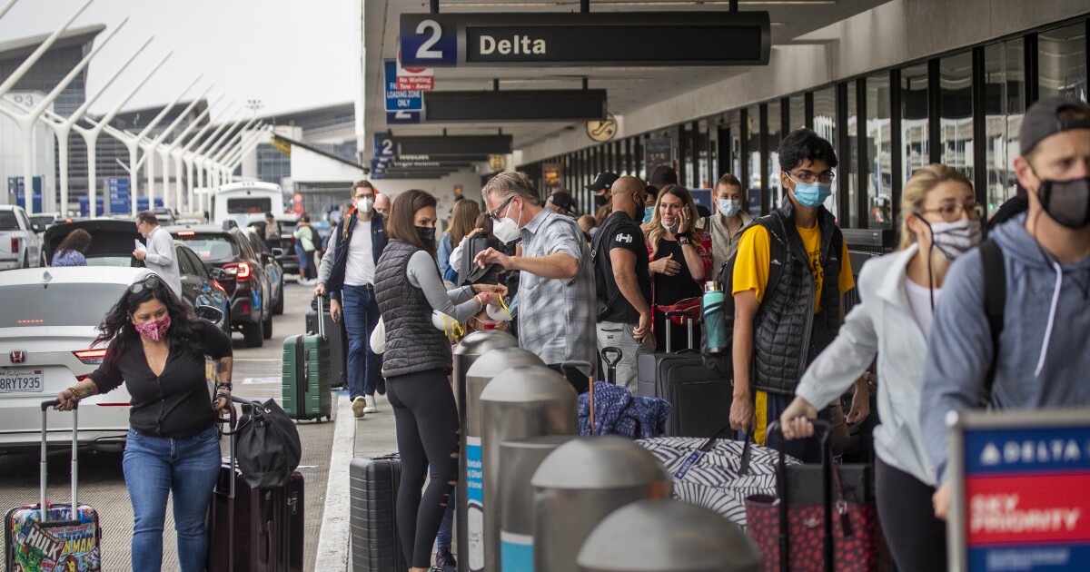 Bisakah TSA memvaksinasi penyaring yang cukup untuk perjalanan Thanksgiving?