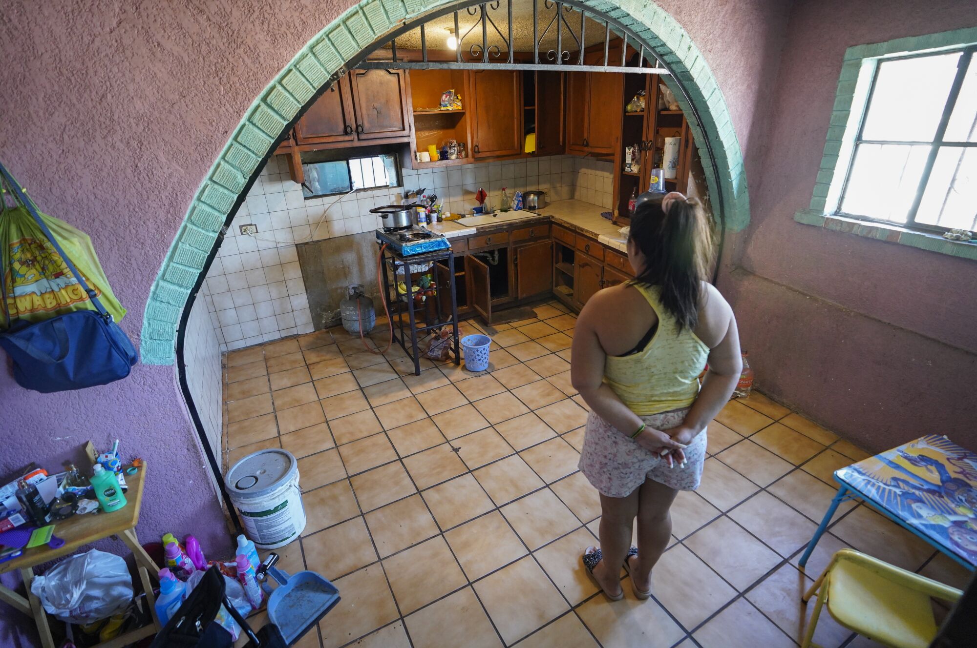 A person in a small apartment