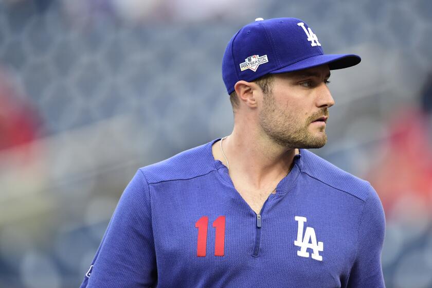WASHINGTON, DC - OCTOBER 07: A.J. Pollock #11 of the Los Angeles Dodgers takes batting practice before Game Four of the National League Divisional Series against the Washington Nationals at Nationals Park on October 7, 2019 in Washington, DC. (Photo by Patrick McDermott/Getty Images)