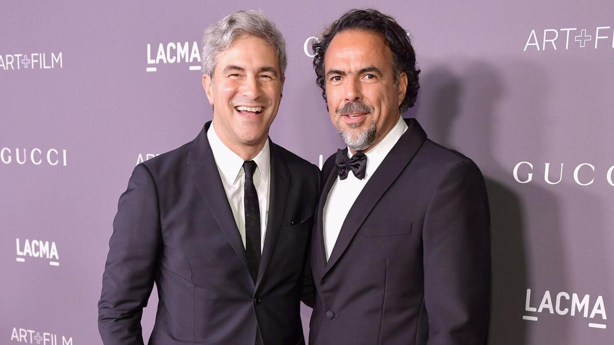 LACMA Director Michael Govan, left, with filmmaker Alejandro Iñárritu.