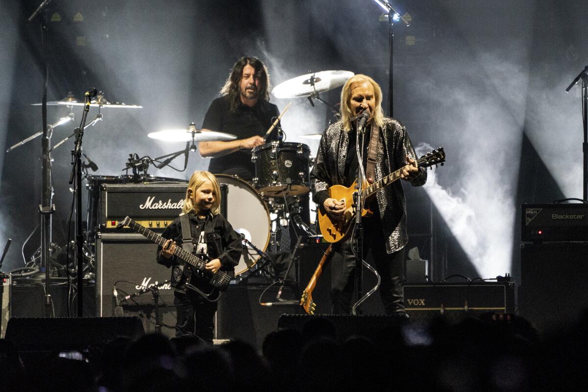 Drummer Dave Grohl, left, and guitarists Roy Orbison III and Joe Walsh, 2022 VetsAid concert