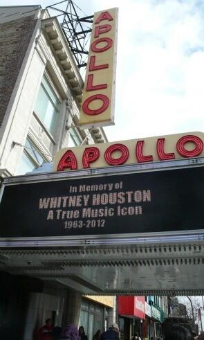 The marquee of Harlem's Apollo Theater bears a tribute to Houston in New York City.