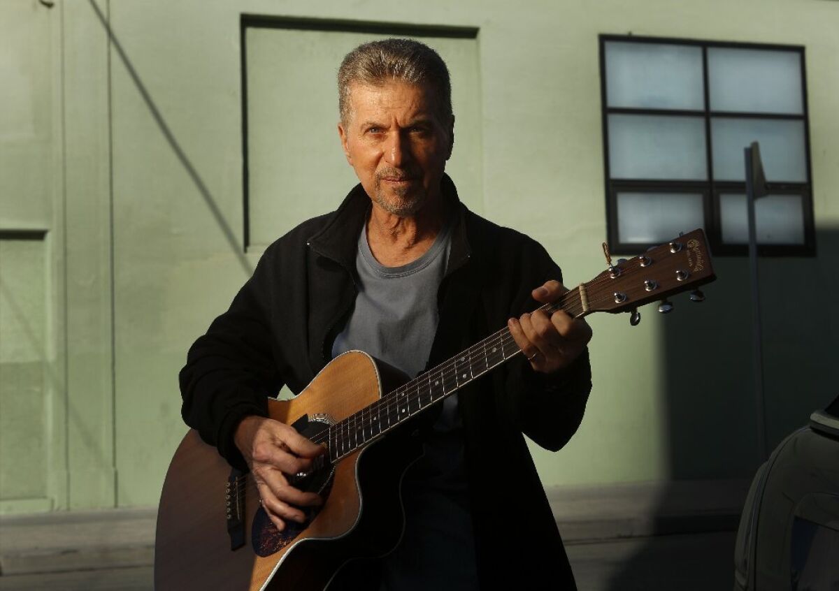 Singer, songwriter, producer, and talent scout Johnny Rivers is photographed in Hollywood.