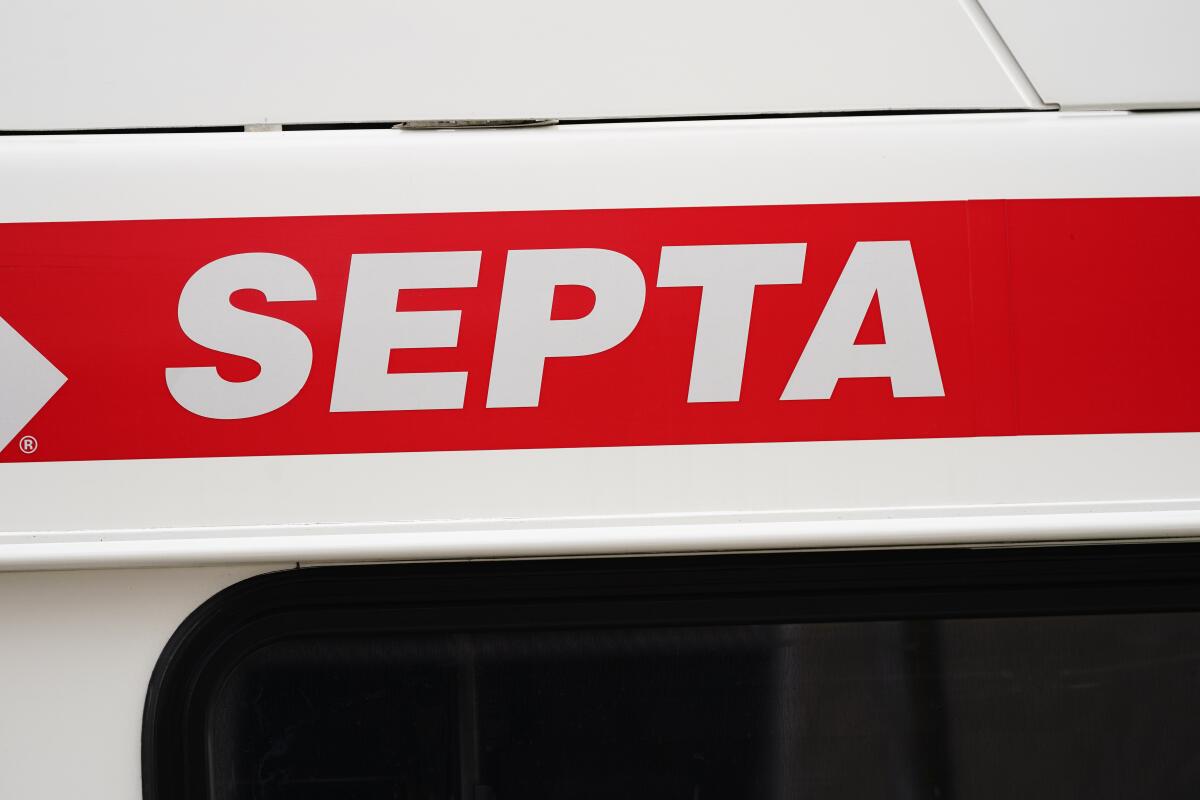 FILE - A Southeastern Pennsylvania Transportation Authority (SEPTA) logo is shown, on Thursday, Dec. 2, 2021. Philadelphia police are looking for a man they say raped a woman on a subway platform while holding her boyfriend at gunpoint early Monday, July 18, 2022. This is the third reported sexual assault since October on a Philadelphia-area commuter train or train platform. (AP Photo/Matt Rourke, File)