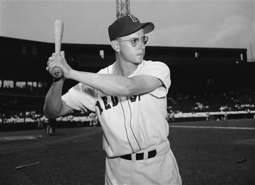 Dom DiMaggio, centerfielder for the Boston Red Sox is shown in this April 22, 1952 file photo. DiMaggio, a seven-time All Star who still holds the record for the longest consecutive game hitting streak in Boston Red Sox history died early Friday morning May 8, 2009 at his Massachusetts home. He was 92. (AP Photo/Green, File)
