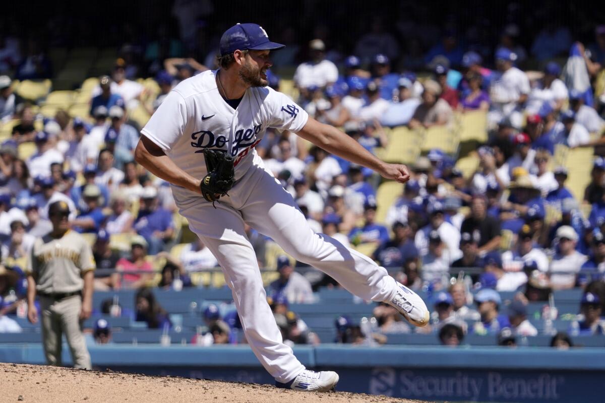 Dodgers pitcher Clayton Kershaw throws to the plate during the seventh inning against the San Diego Padres.