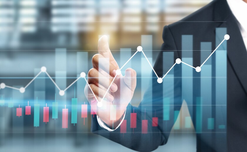Businessman plan graph growth and increase of chart positive indicators in his business