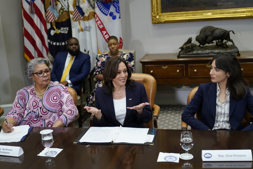 Vice President Kamala Harris, center, flanked by Texas state Rep. Senfronia Thompson, D-Houston, left, and Texas state Rep. Gina Hinojosa, D-Austin, right, speaks during a meeting with members of the Texas State Senate and Texas House of Representatives in the Roosevelt Room of the White House in Washington, Wednesday, June 16, 2021. Member of the Texas delegation in May blocked passage of legislation that would have made it significantly harder for the people of Texas to vote. (AP Photo/Susan Walsh)