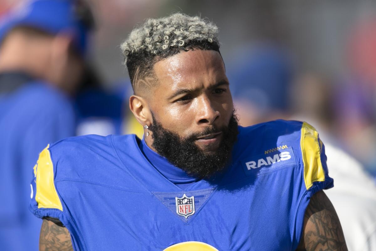 Rams wide receiver Odell Beckham Jr. walks on the sideline during a NFL divisional playoff football game.