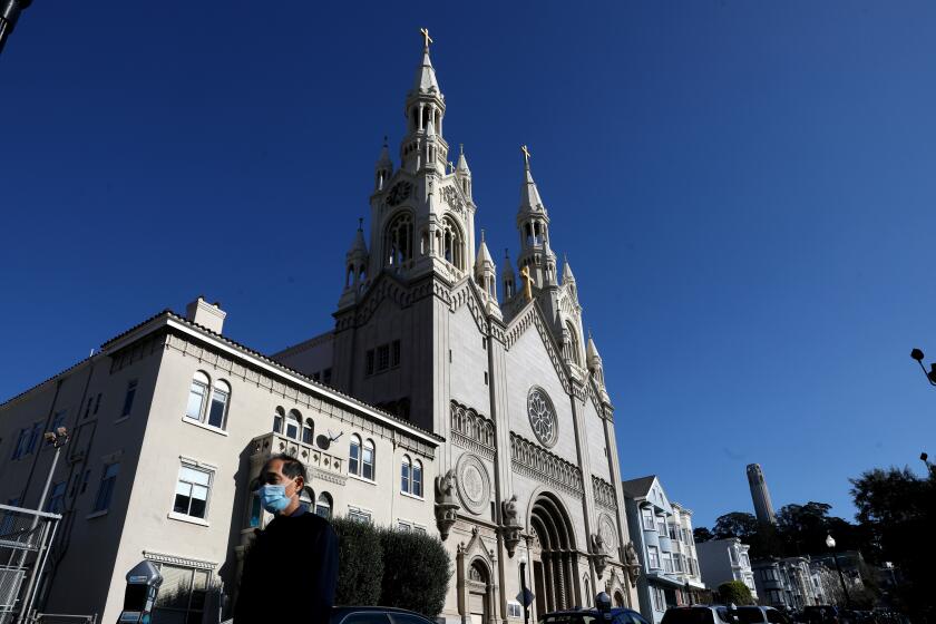 SAN FRANCISCO, CA - FEBRUARY 10: Saints Peter and Paul Church pauses in-person mass after three priests test positive for COVID-19, Wednesday, Feb. 10, 2021 in San Francisco, CA. (Gary Coronado / Los Angeles Times)