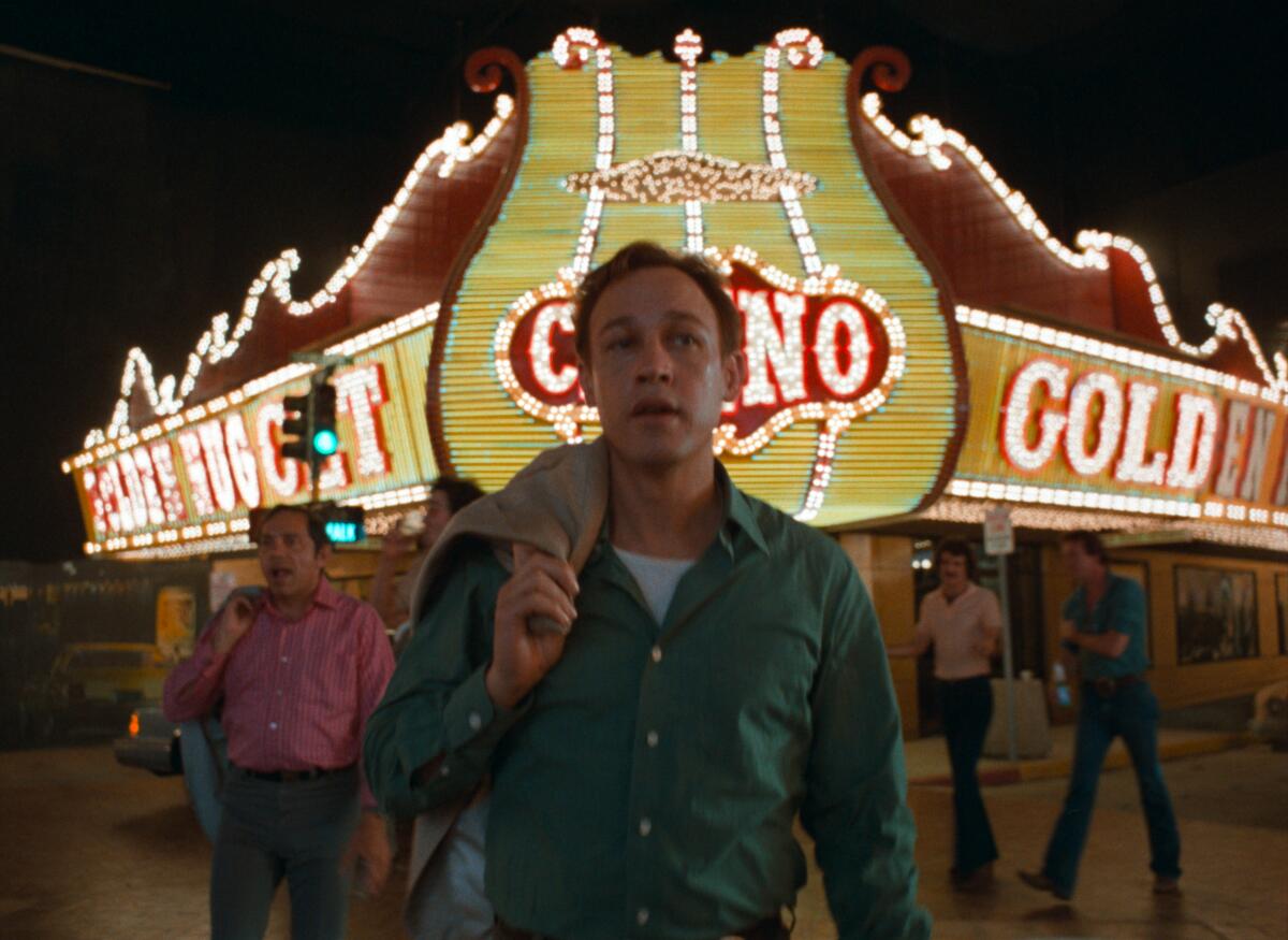 A man walks in front of a Las Vegas casino.