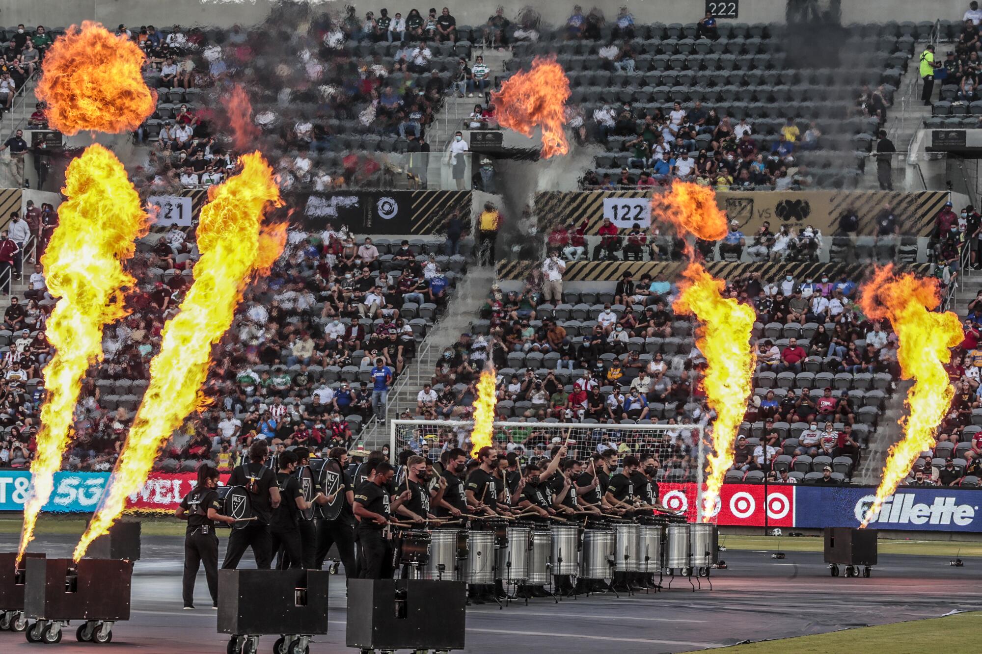 A fiery pregame show featured a phalanx of drummers and flames at the MLS All-Star game