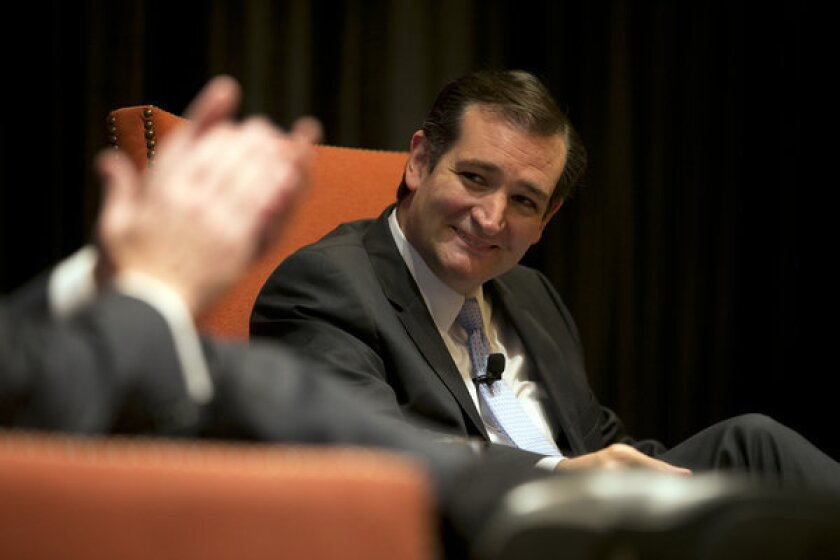 Republican Sen. Ted Cruz of Texas smiles during an event held by the Austin Chamber of Commerce in Austin last month. National Review reported Wednesday that Cruz is mulling a run for the presidency.