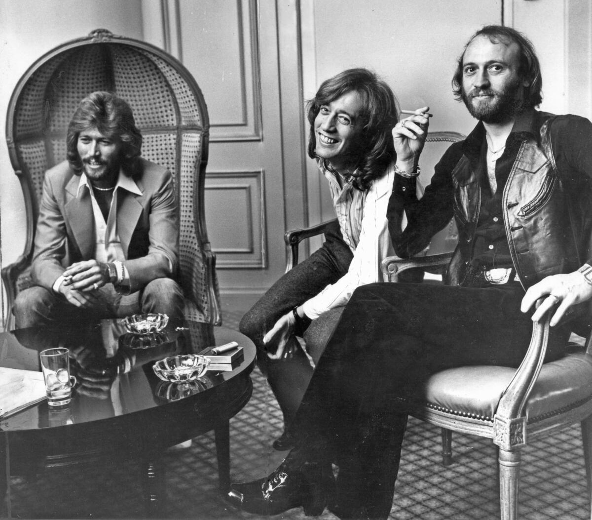 The Bee Gees -- Barry, left, Robin and Maurice Gibb -- were riding high off the success of their blockbuster hit soundtrack album "Saturday Night Fever" when this L.A. Times file photo was shot in 1979.