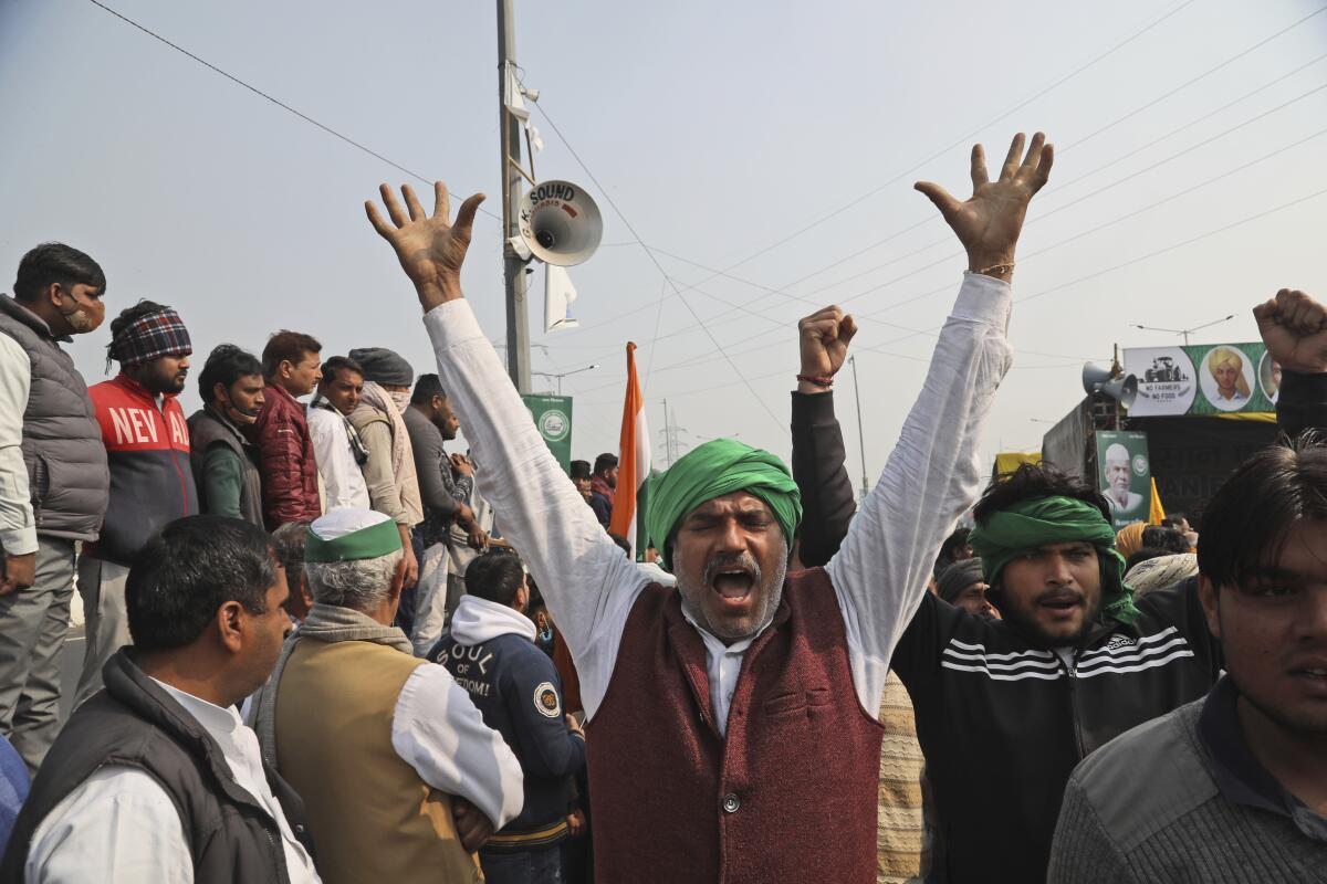 Farmers protest agriculture laws on the outskirts of New Delhi.