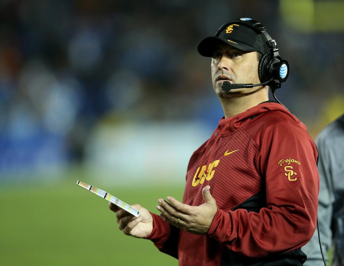 USC Coach Steve Sarkisian gestures during a game against UCLA at the Rose Bowl on Nov. 22, 2014